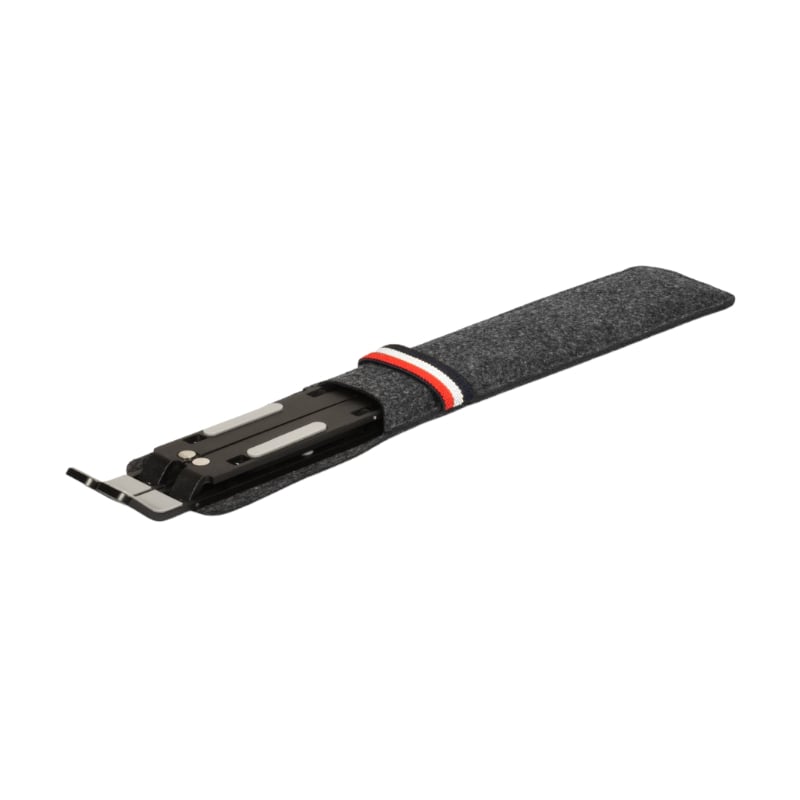Black textured watch strap with metal clasp on a white background