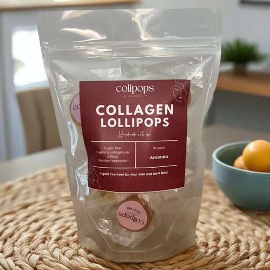 Package of collagen lollipops with a label on a woven surface.