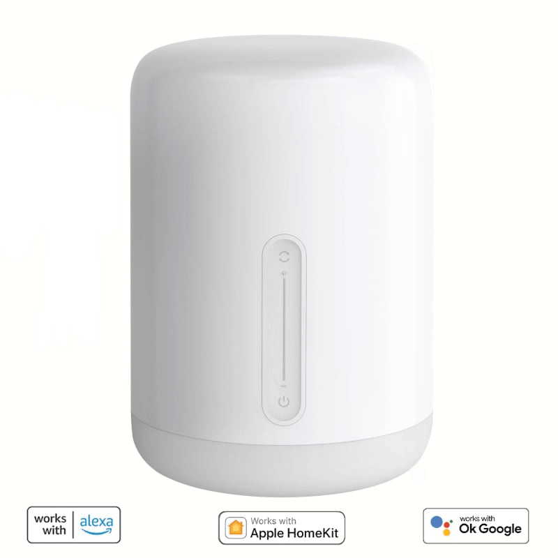 White cylindrical device with Alexa and Google Assistant logos on a beige background